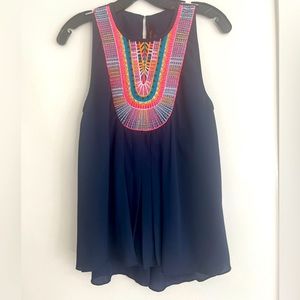 Sleeveless swing top with embroidery